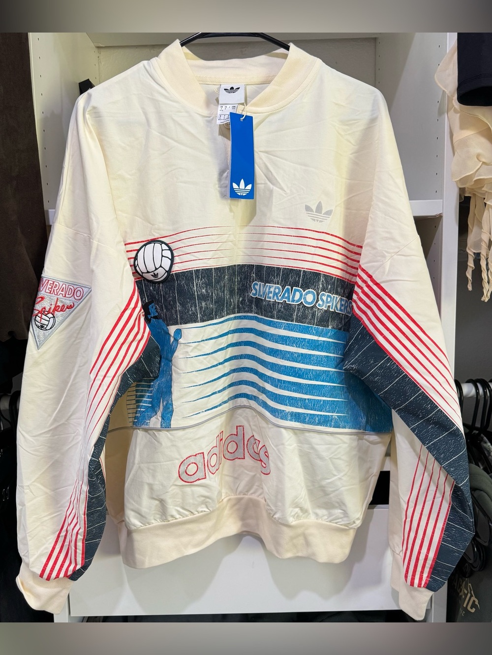 adidas Cream Tee with Blue Trefoil Tag and Subtle Red Accent
